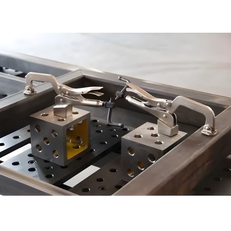 Toggle clamp for welding table